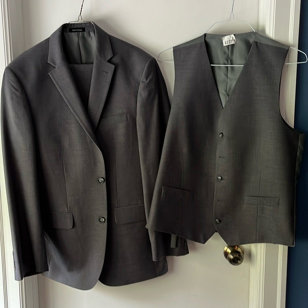 Three piece men’s gray suit. Jacket, pants and vest.